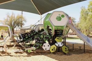 Playground slide and climbing walls at Brooks Crossing Park