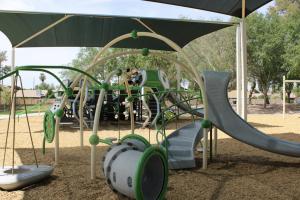 Playground slide and tunnel at Brooks Crossing Park