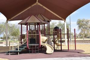 Playground monkey bars and slides at Chuparosa Park