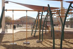 Play structure with monkey bars at Crossbow Park
