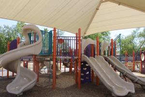 Playground slides and climbing walls at Espee Park