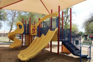 Playground with triple slide and stairs at Harter Park