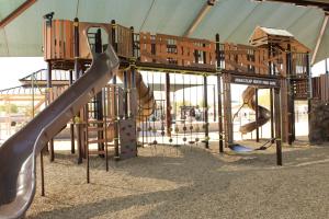 Playground slide and climbing wall at Homestead North Park