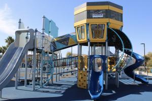 Playground slides and tower at Lantana Ranch Park