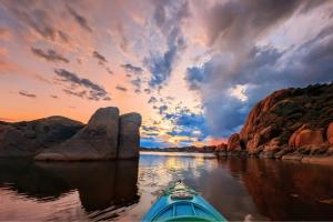 a kayak on the lake at dusk
