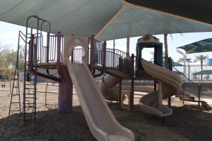 Playground slides and climbing feature at Nozomi Park