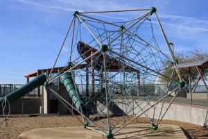 Playground climbing tower at Paseo Vista Recreation Area