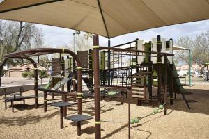 Playground monkey bars and climbing features at Pecos Ranch Park