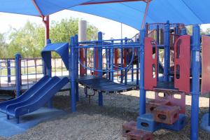 Playground slide and bridge at Pima Park