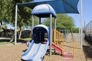 Playground slide and stairs at Pueblo Alto Park