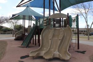 Playground with triple slide and climbing wall at Ryan Park