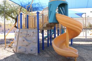 Play Structure With Slide And Climbing Wall At Sundance Park