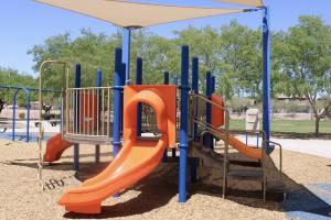 Small Play Area With Slides And Swings At Tibshraeny Park