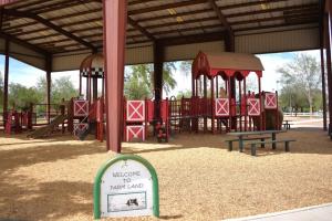 Farm Land Playground With Climbing Structures Ramps And Slides At Tumbleweed Park