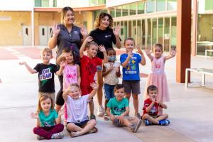 building blocks instructors posing with their class